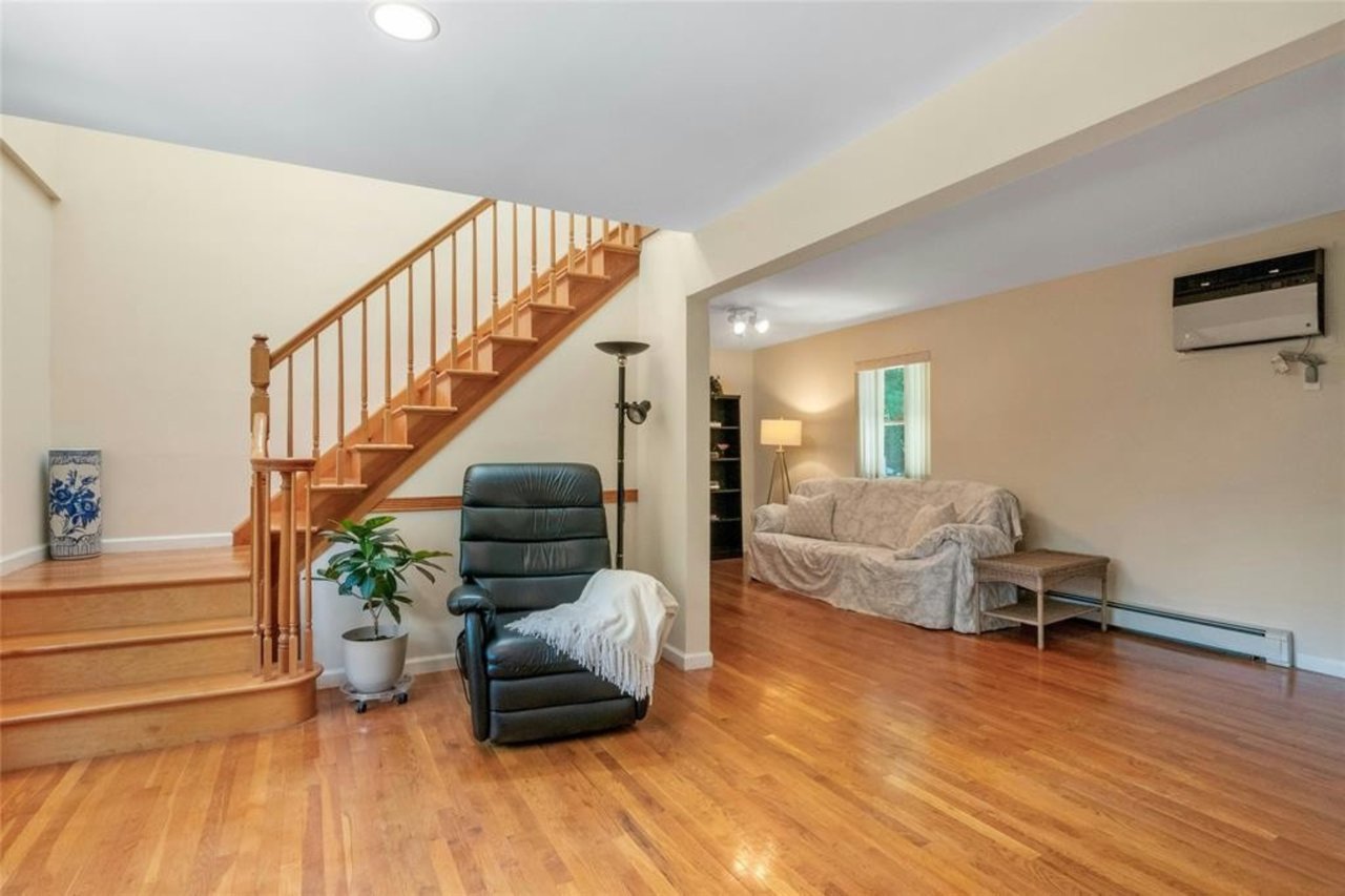 Actual view - Living room with alcove. view from foyer