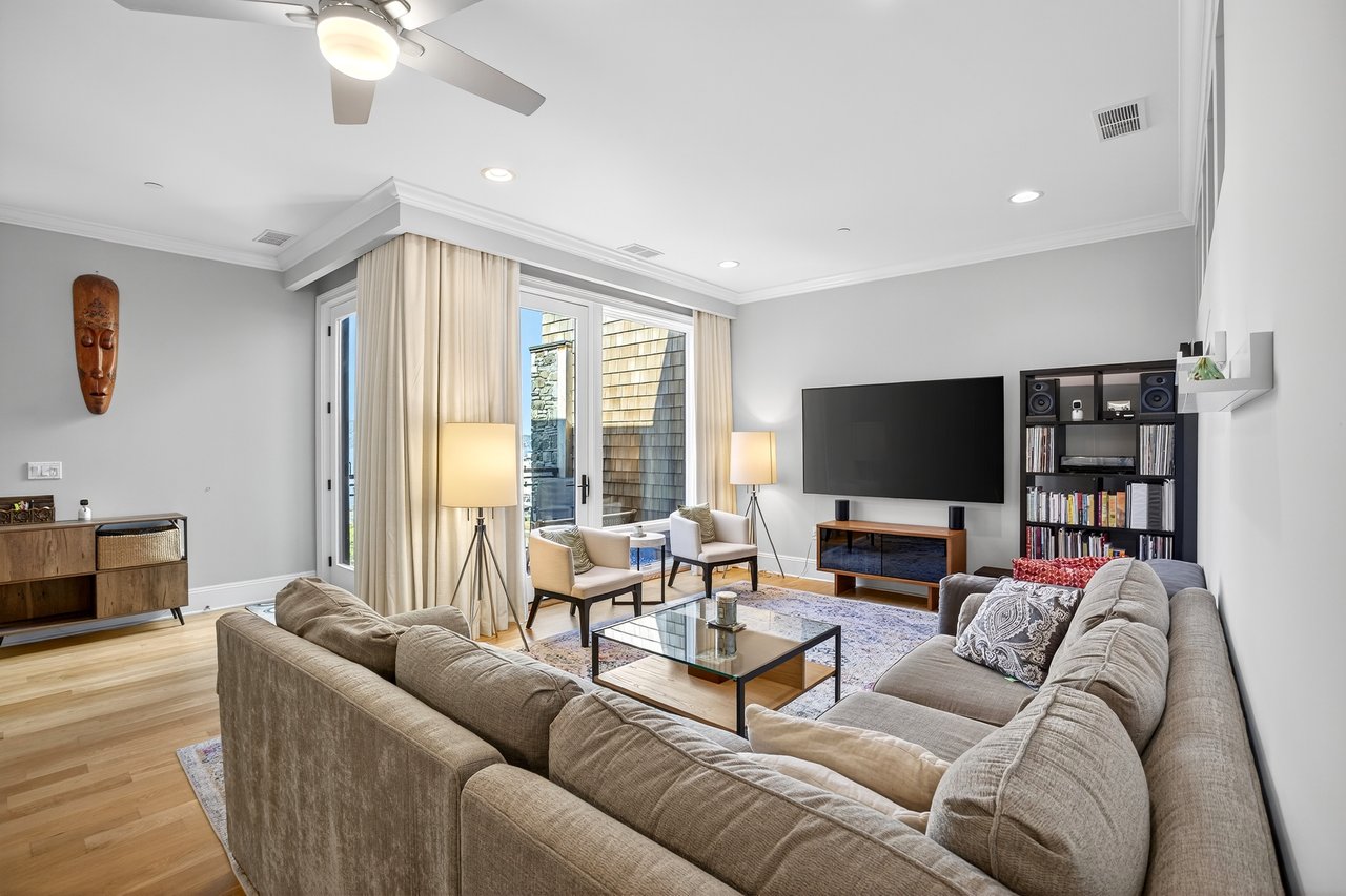 Living room featuring ceiling fan, recessed lighting...
