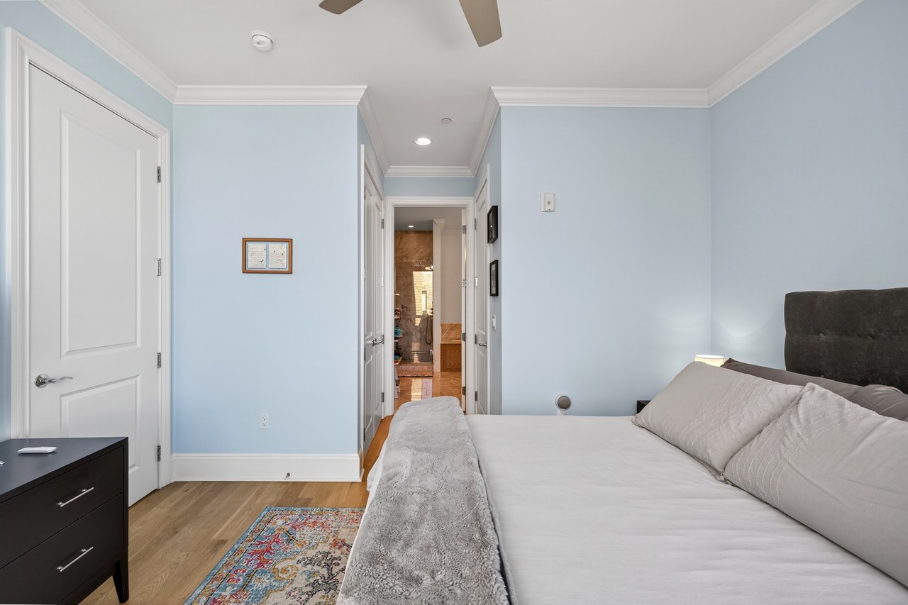 Bedroom with view into ensuite bathroom
