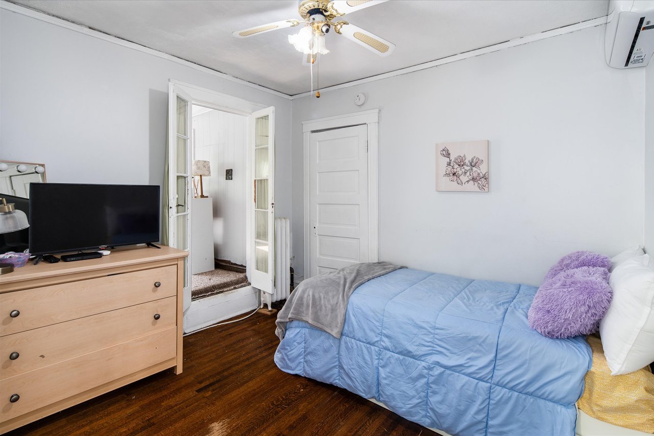 Bedroom 2 has a flow through layout