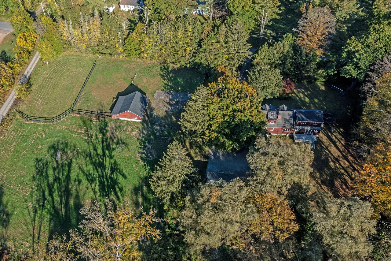 Aerial view of barn and house