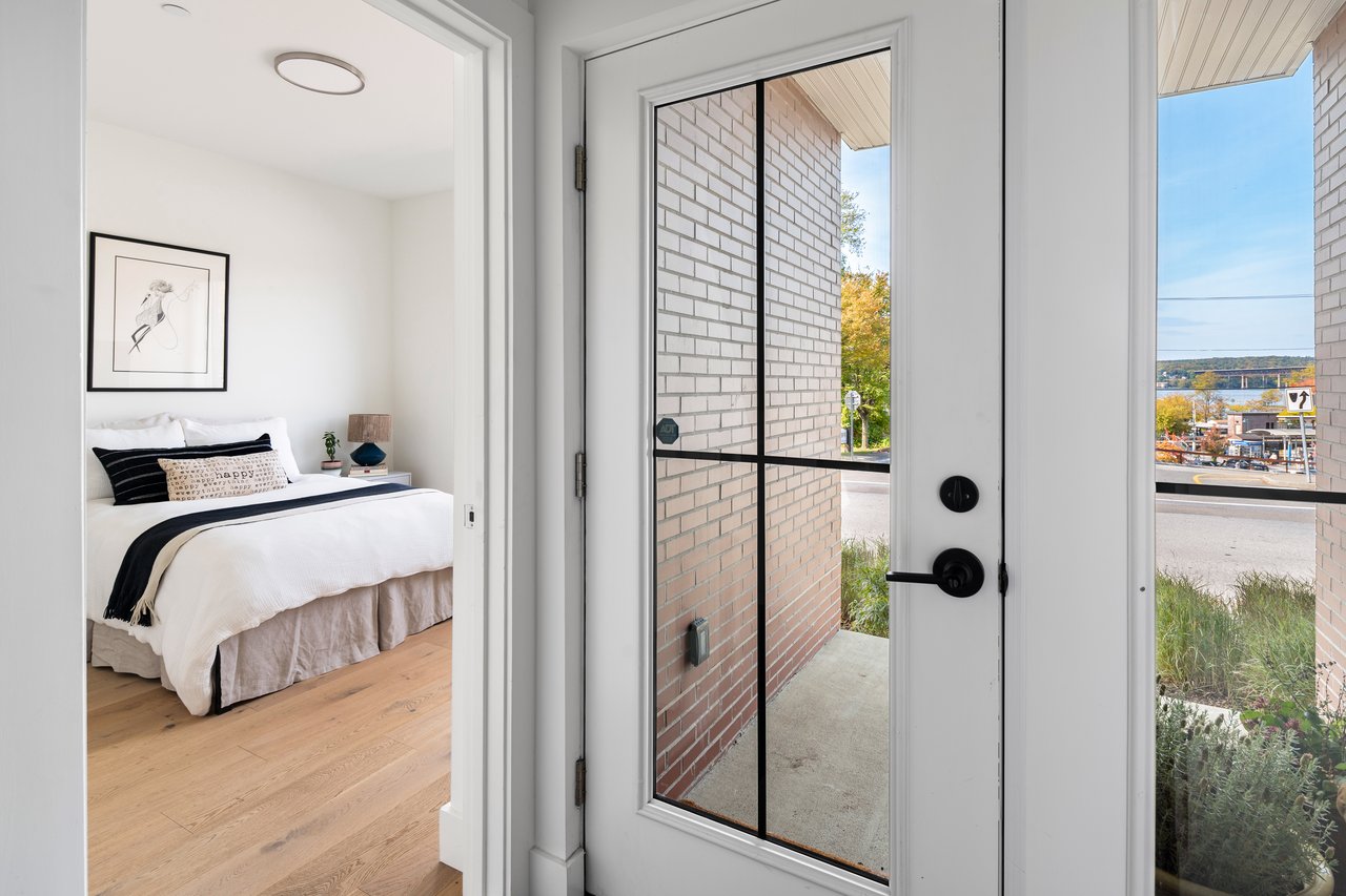 First floor bedroom with adjoining bathroom and walk-in closet.