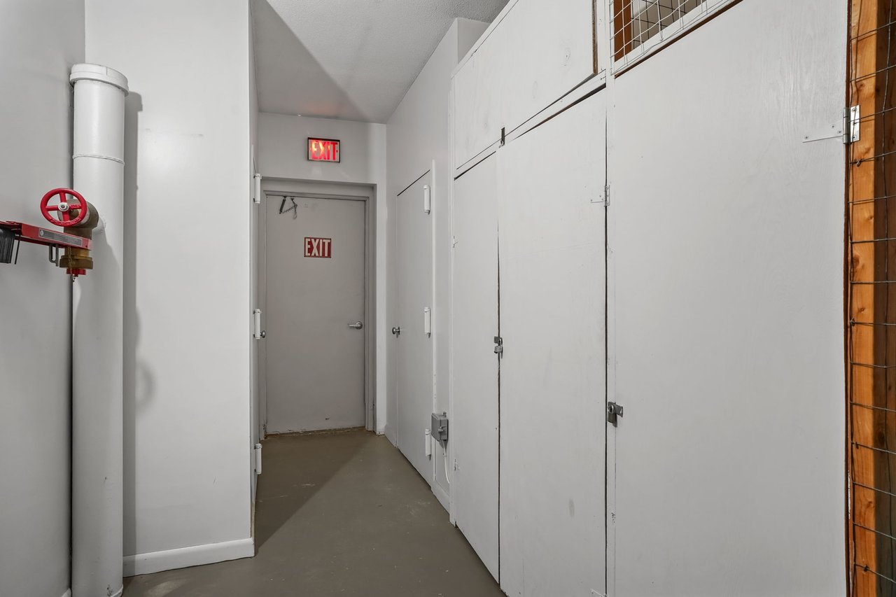 Storage closet located in hallway outside unit.