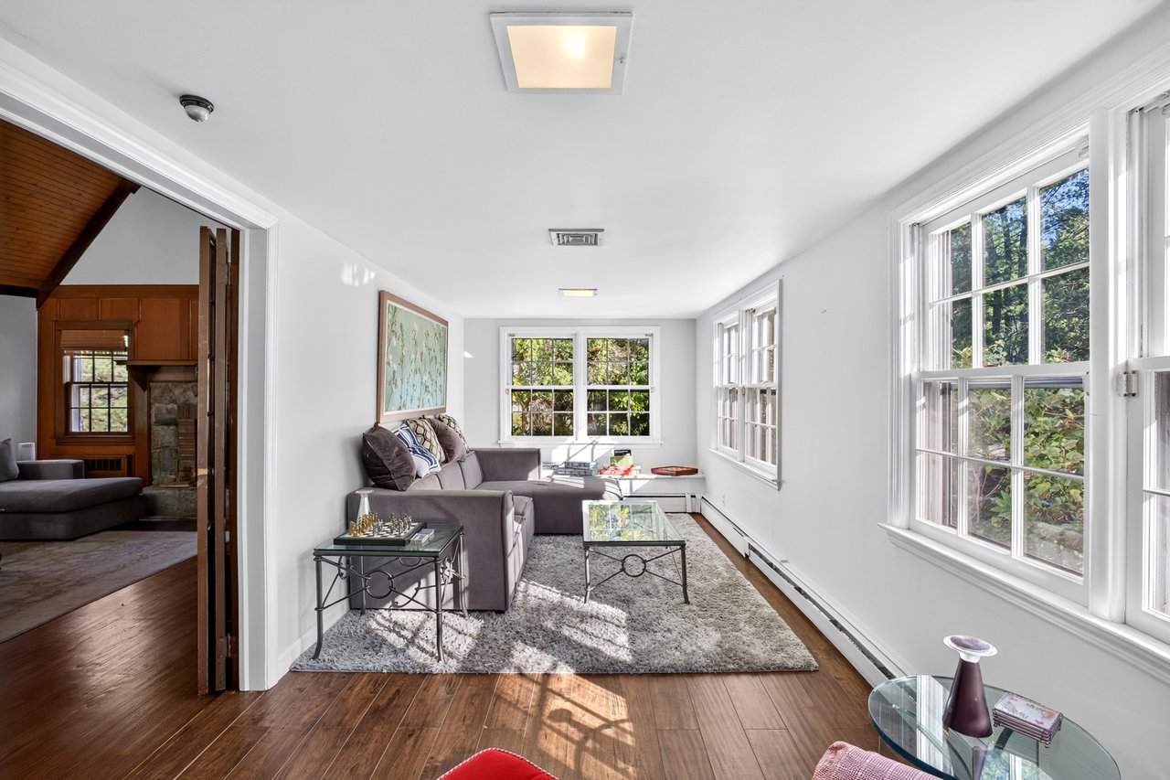 Den area featuring plenty of natural light