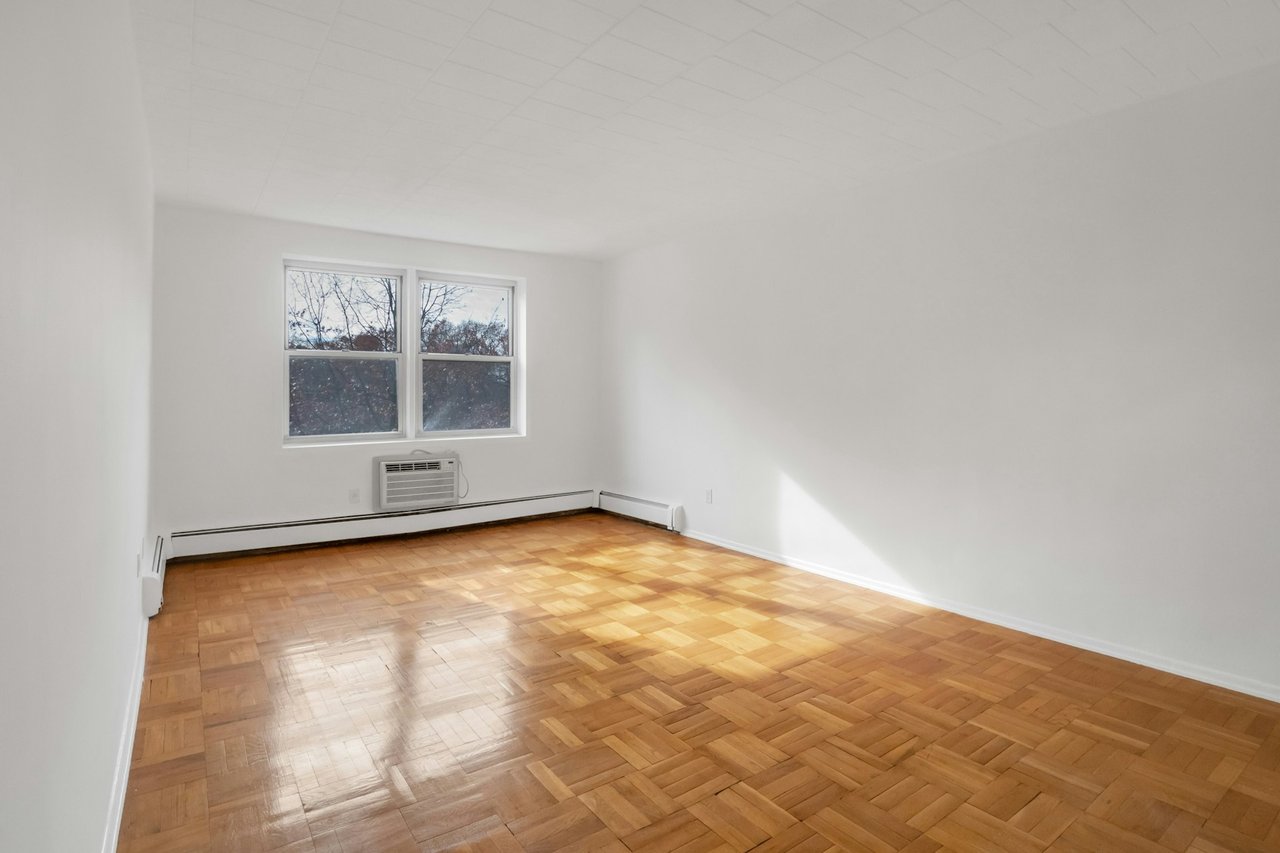 Bright living room with open area to kitchen