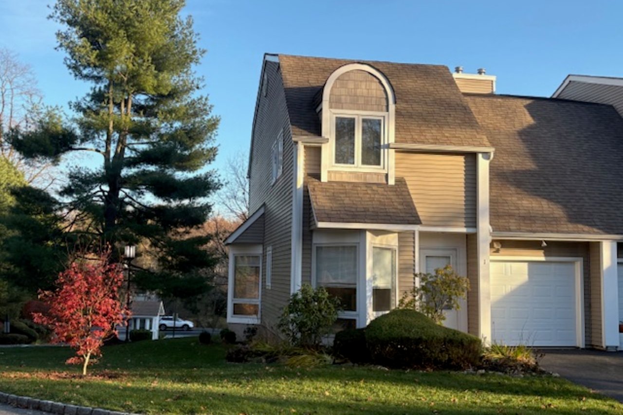 View of front of home featuring an attached garage