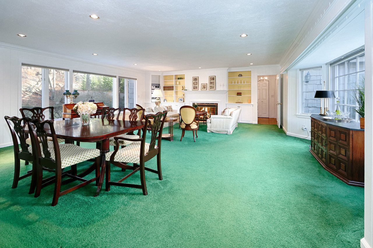 Great room features bay window in front which provides views of front garden.