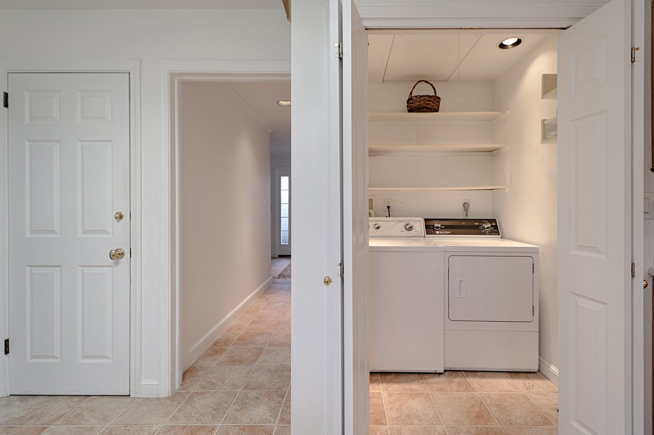 Laundry area off kitchen.