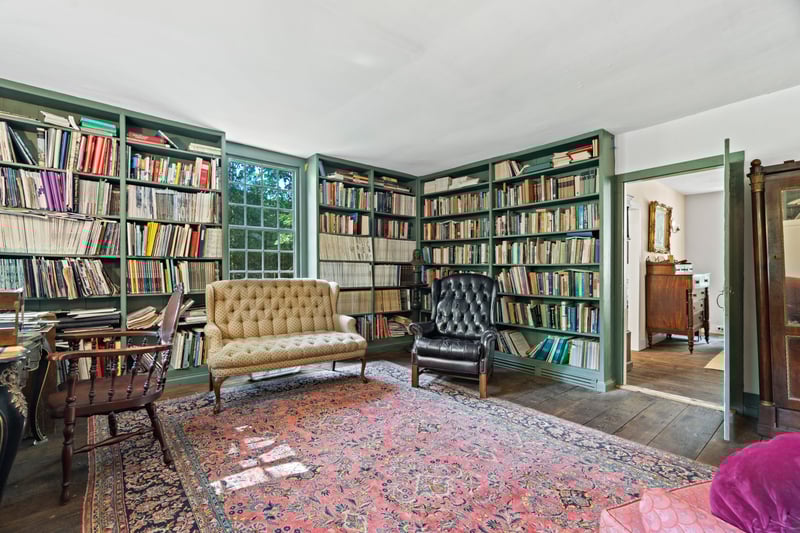The 200 square foot library is a sunlit, cozy retreat for readers or for the currently sought after at-home office space.