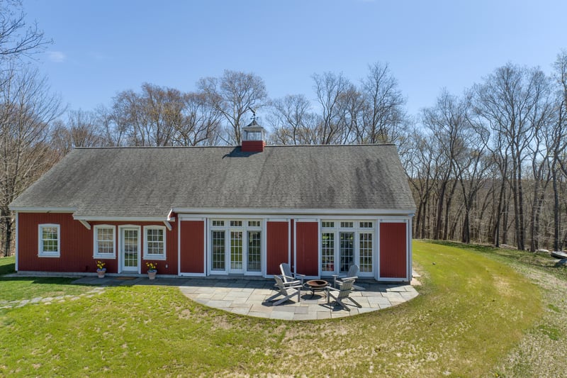 The 1800sqft guest house features it's own bluestone patio.