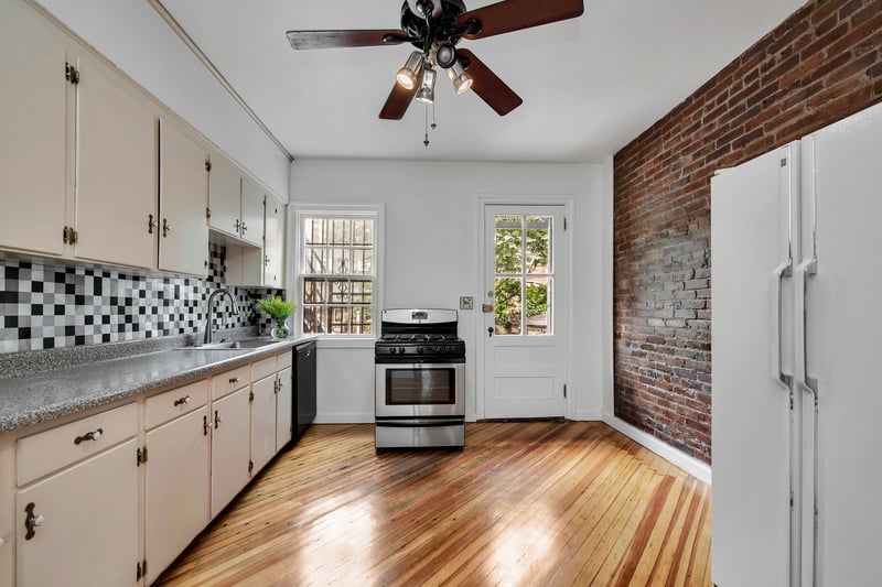 Kitchen with the entry to the backyard
