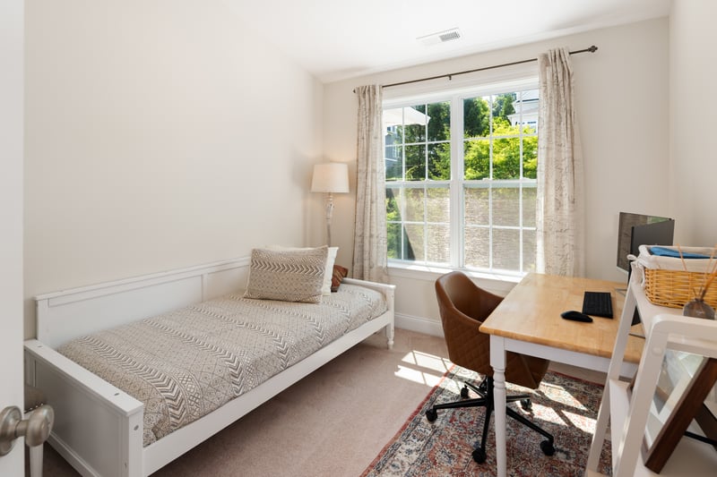 Bright, sunny 3rd bedroom with high ceilings.
