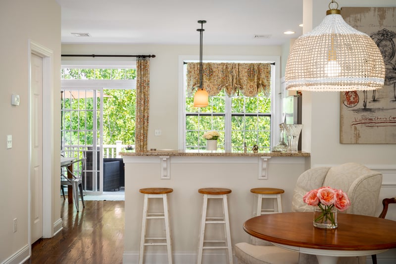 Open Kitchen with Stylish lighting and breakfast bar.  