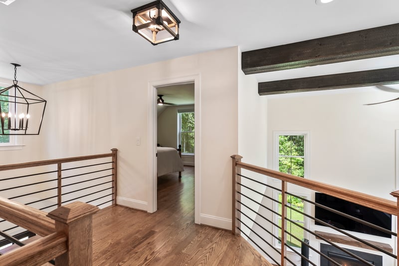 Hall open to front entry and great room