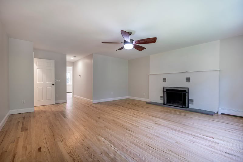 Laundry room tucked in the hallway.