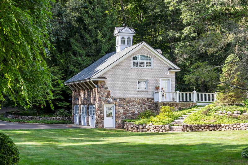 View of the six car garage from backyard