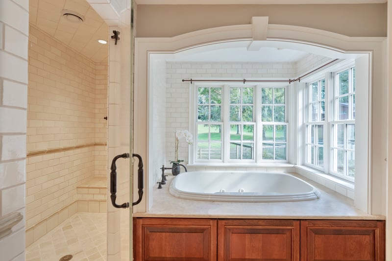 Primary bath with Euro shower and whirlpool soaking tub. RELAX