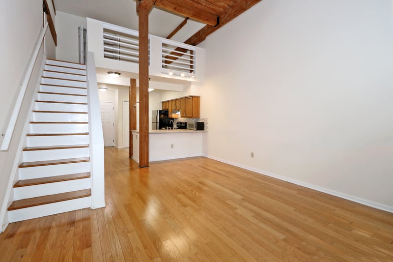 Upstairs is the loft bedroom, and primary bath.