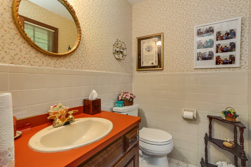 Powder Room conveniently and privately located off Kitchen.	