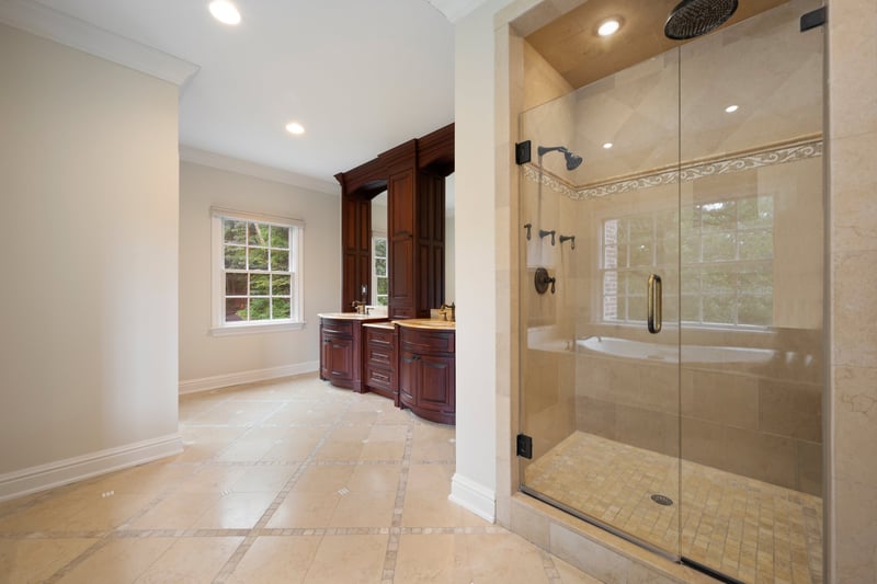 Primary Bath with oversized shower and double sinks. Floor and counters are Onyx!
