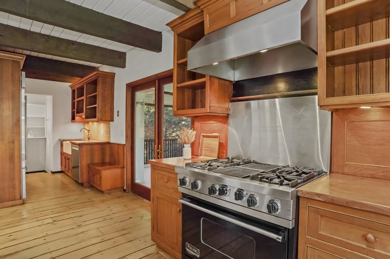 Updated Kitchen with Viking gas range and range hood.
