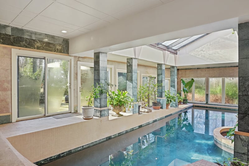 The polished concrete Pool, uses bromine (much less harsh on the eyes than chorine!).