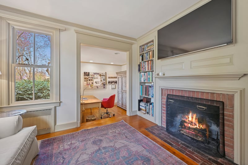 Den with gas fireplace and built-ins