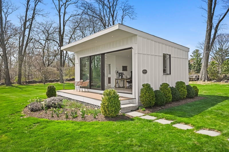 Pool house with kitchenette and full bath. Currently being used as remote office