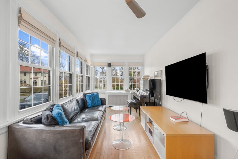 Sunroom with wood finished floors