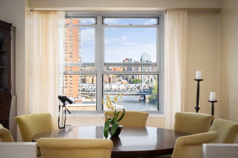 Dining area with a city view and plenty of natural light