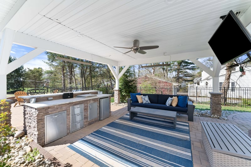 View of patio featuring an outdoor hangout area, a ceiling fan, area for grilling, and fence