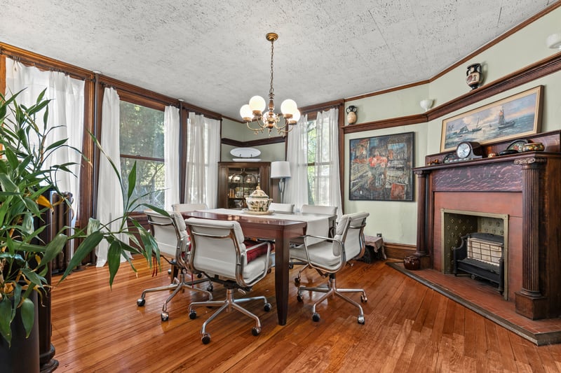 Large formal dining room with a 2nd decorative fireplace
