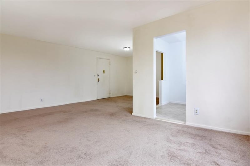 An expansive entry has plenty of room for a dining table or a home office setup....