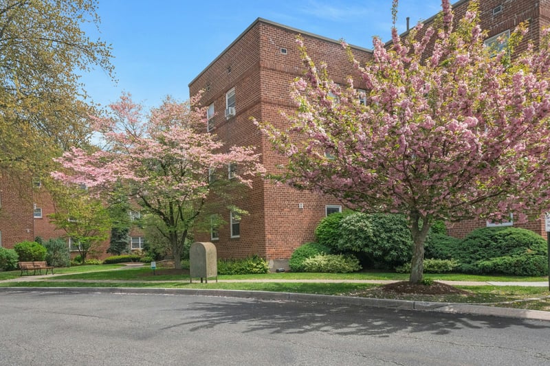 View of property exterior featuring brick siding