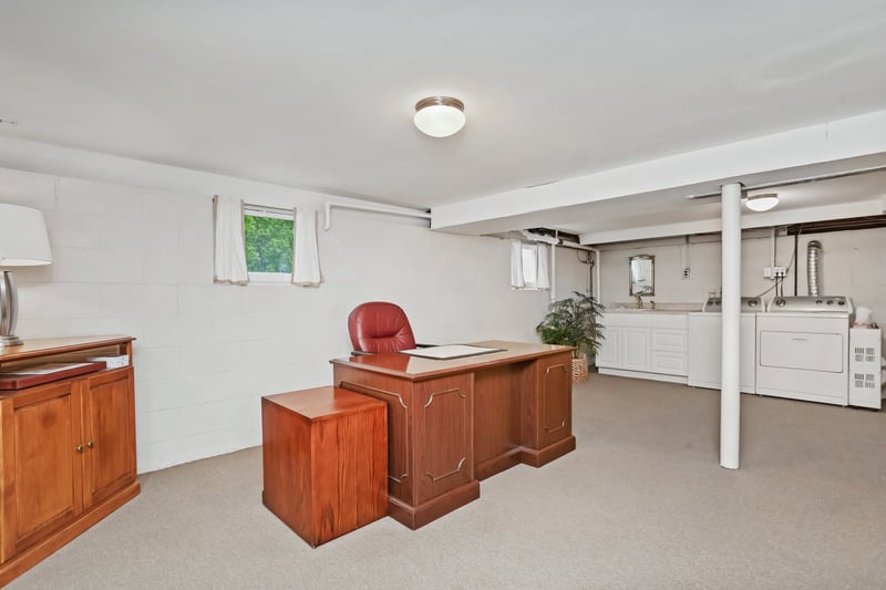 Lower level is DRY! Laundry and rec room here