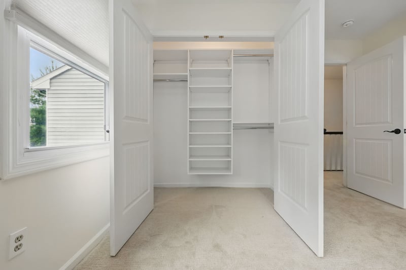 Guest bedroom custom fitted closet.