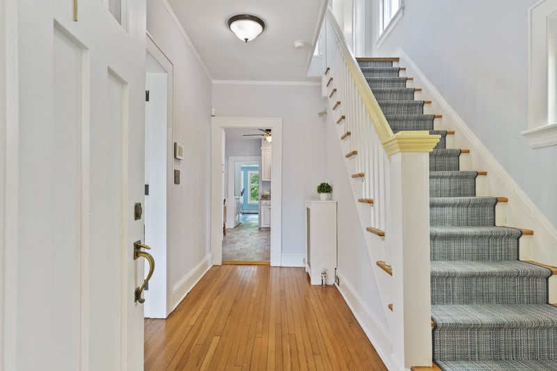 Beautiful center hallway with gorgeous stair runner