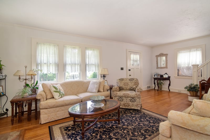 The living room provides a seamless flow that's conducive to entertaining....
