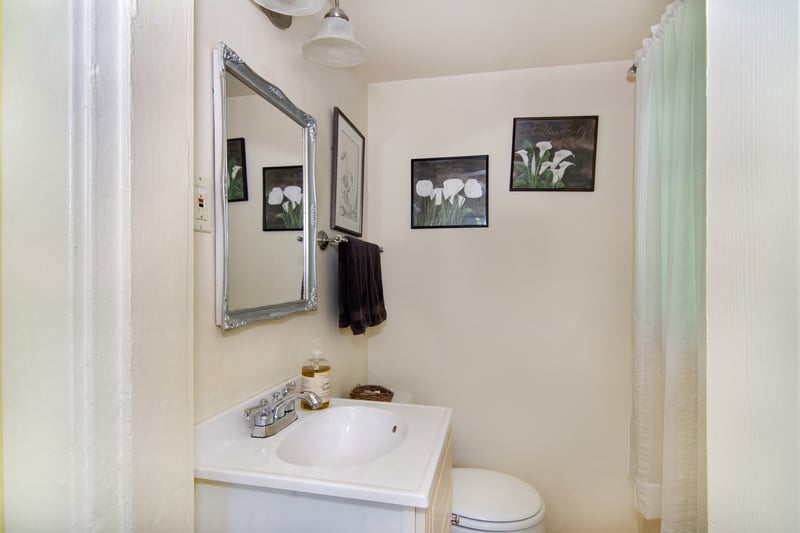 A half bath is conveniently located off of the kitchen....