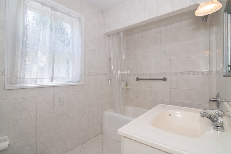 A simply updated full bathroom is conveniently accessible from all three bedrooms....