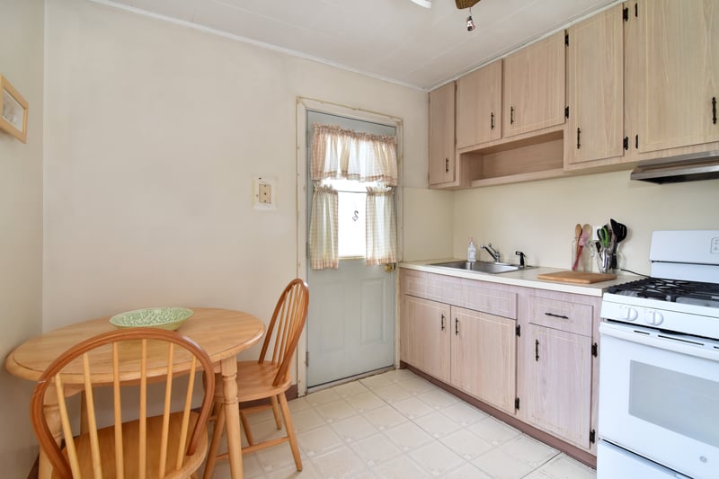 An eat-in kitchen offers a functional space, ready for your updates and style.