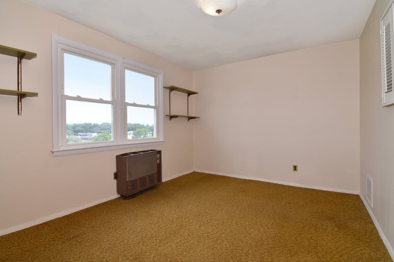 Attic dormers have been raised in order to make this bonus room more comfortable as a sleeping space.