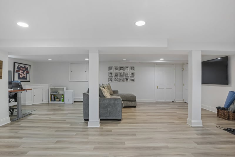 Lovely lower level for work, gaming, fitness and toys!