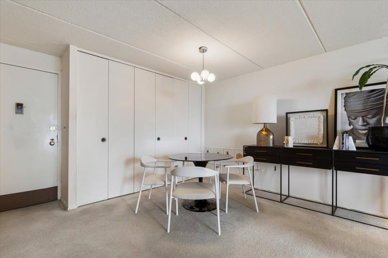 Dining space with light carpet