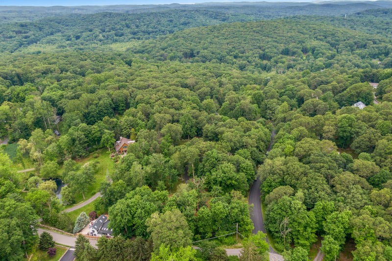 Drone / aerial view of a heavily wooded area