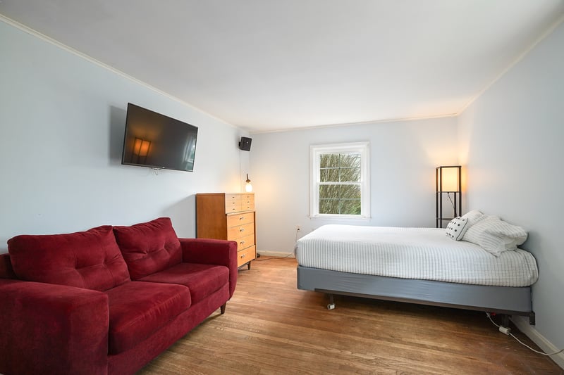 First floor bedroom with hardwood floors