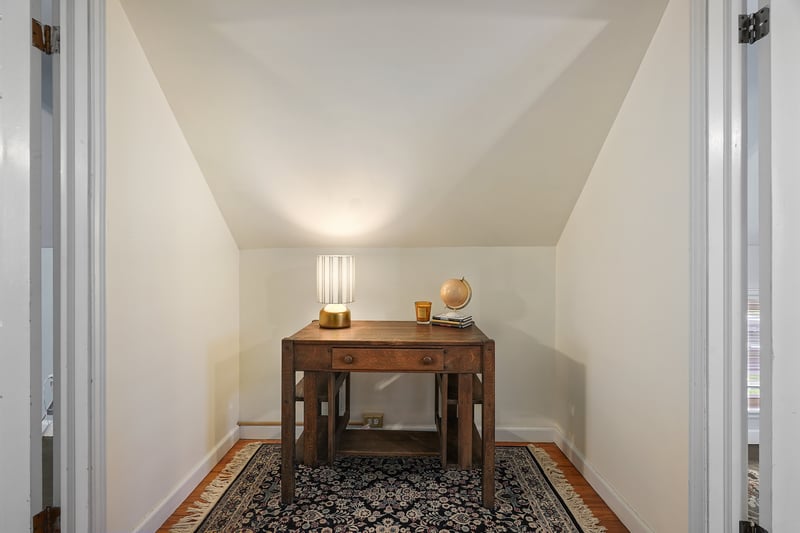 Office with wood finished floors