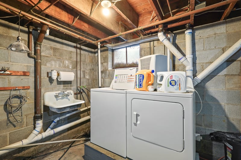 Laundry area with washer, dryer and sink