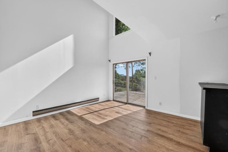 Light-Filled Living/Dining Room with Vaulted Ceilings