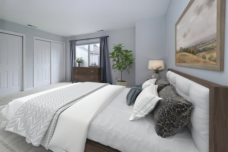 Virtually staged photo of primary bedroom. Plenty of space for a king sized bed and more!